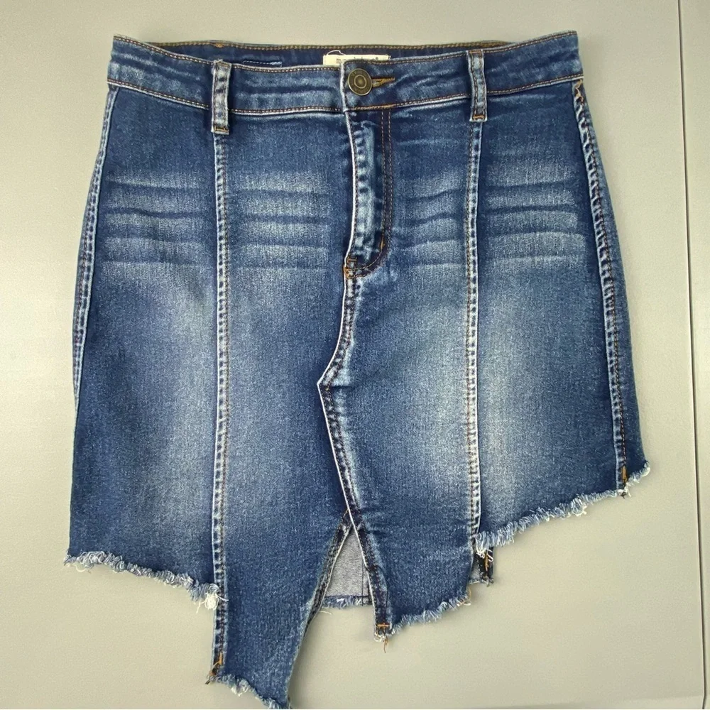 Machine torn up look blue jean mini skirt with stretch size large
